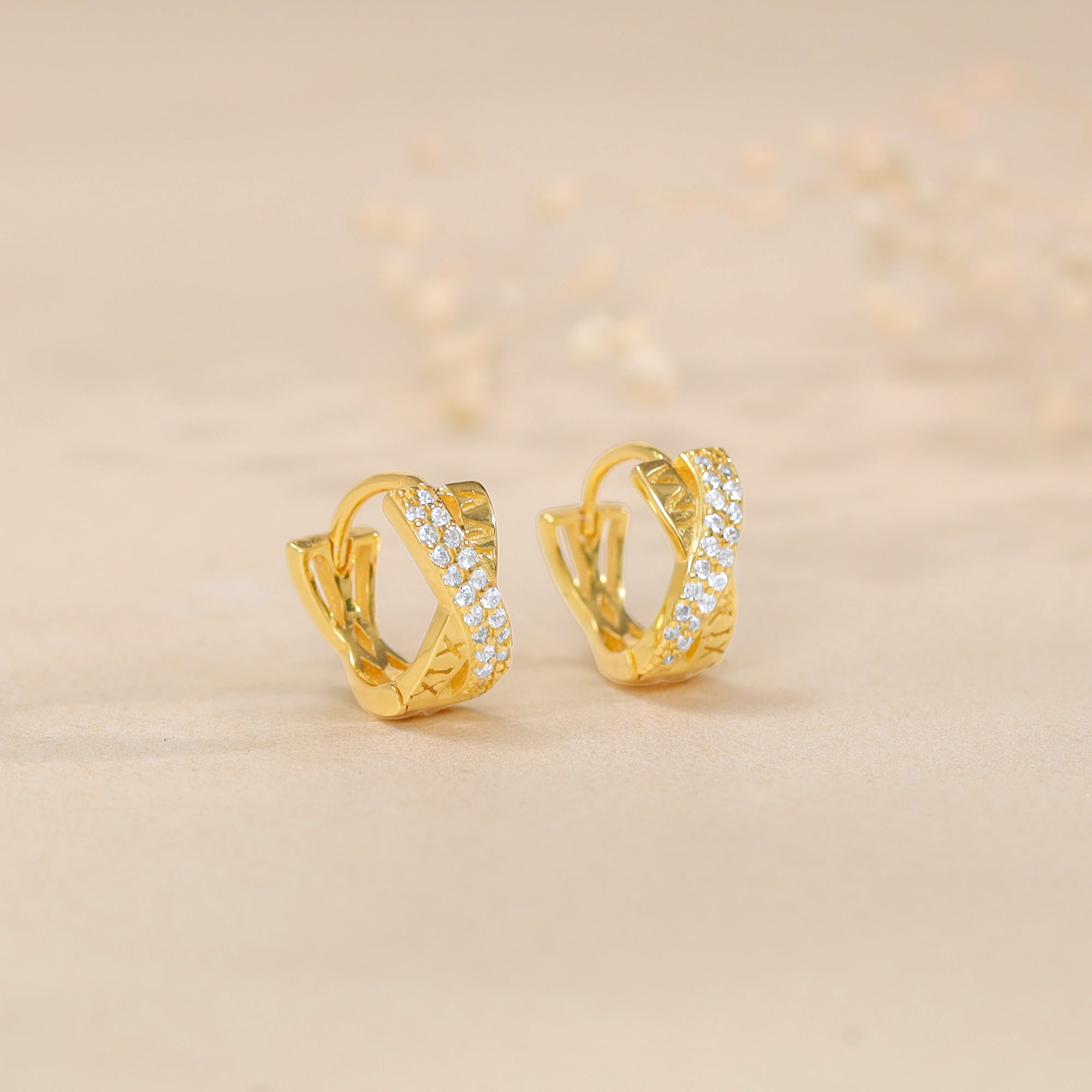 Golden Zircon Studded Twisted Huggies Earrings